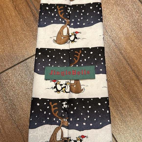 Winter themed Cartoon tie from the Jingle Bells company. - Picture 2 of 4